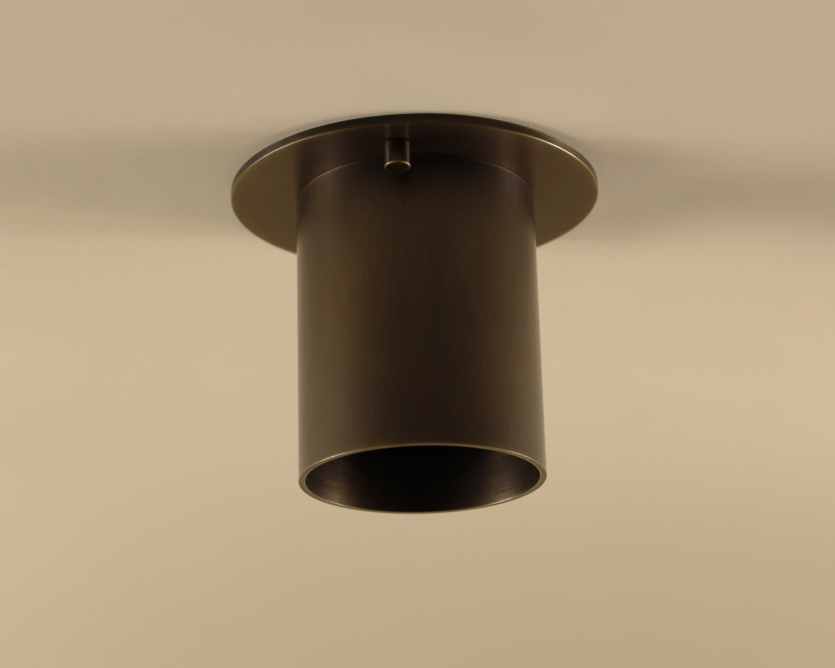 Ceiling light fixture on a beige wall