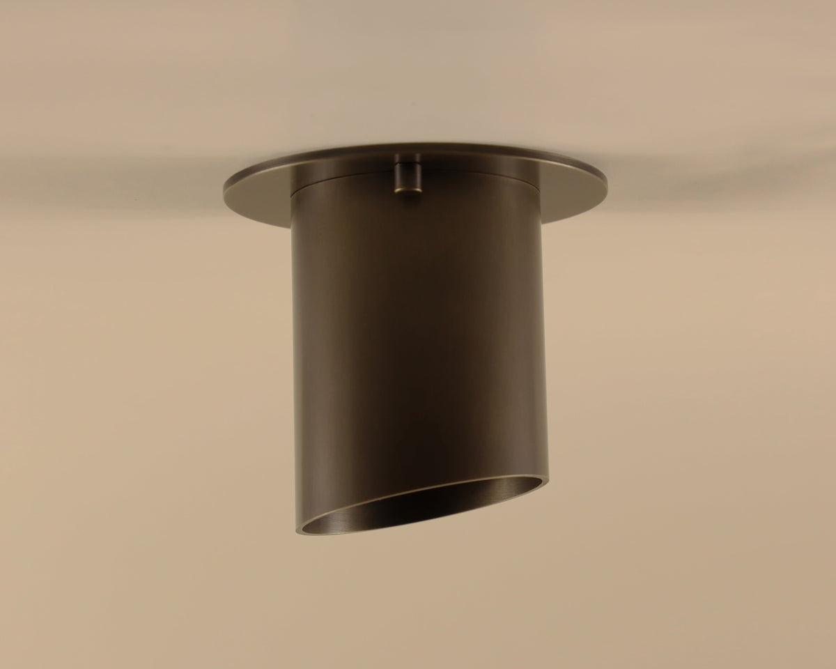 Ceiling light fixture on a beige ceiling