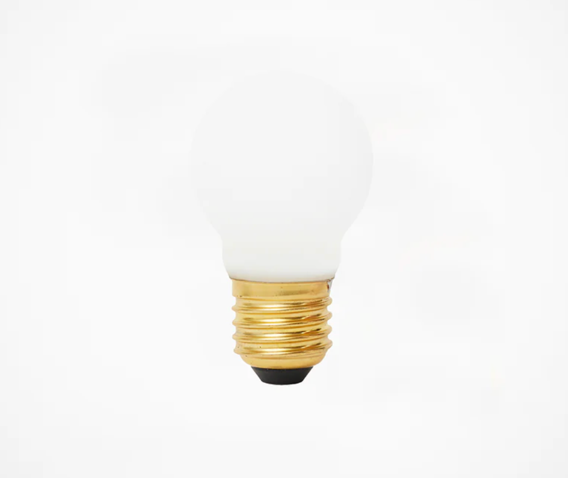 The Bulb - Tala Sphere I - E26 - Dim-To-Warm LED by Long Made Co. is a white dimmable bulb with a round frosted glass top and gold E26 base, shown centered on a plain white background.