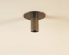 Ceiling light fixture on a beige wall