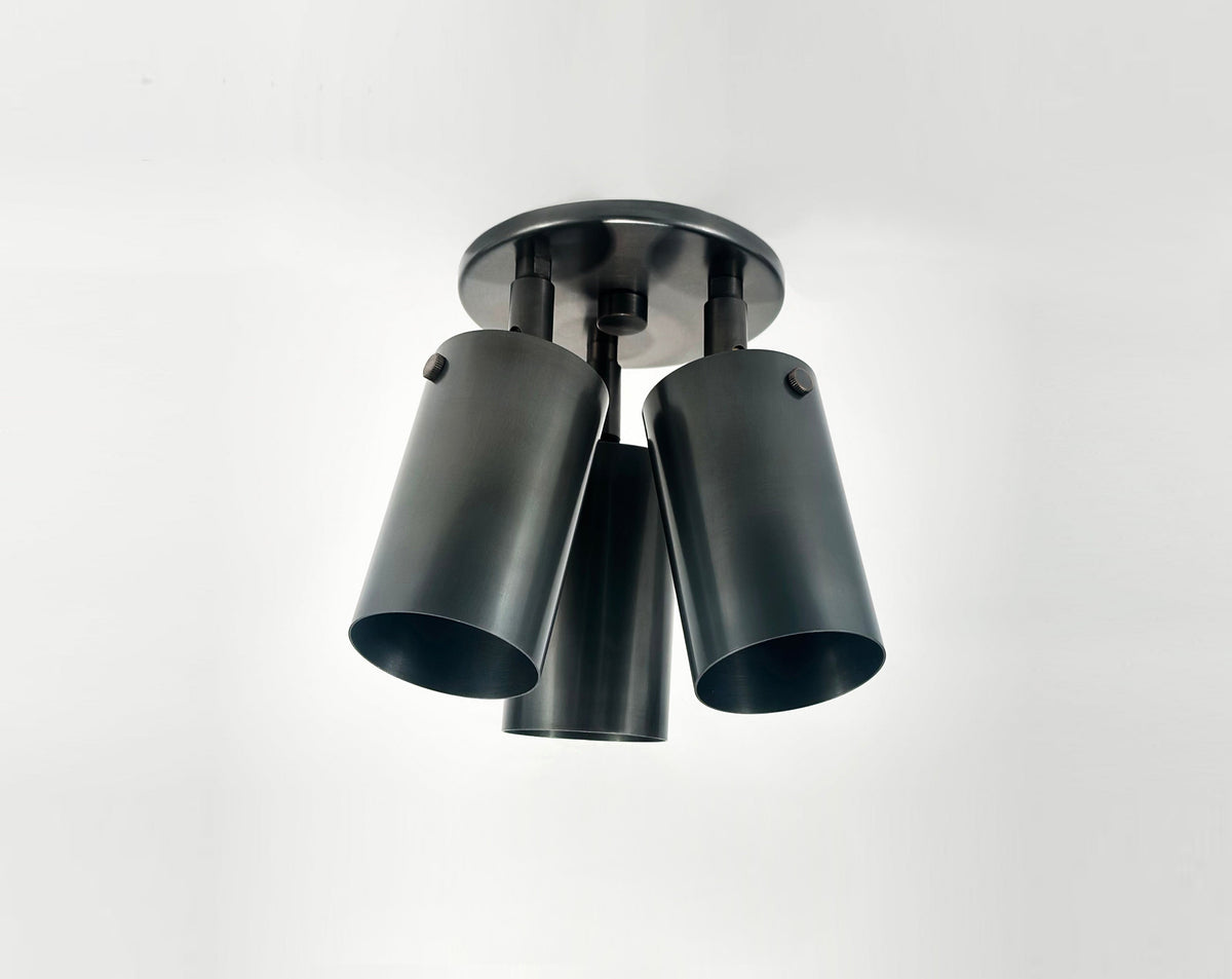Black ceiling light fixture on a white background